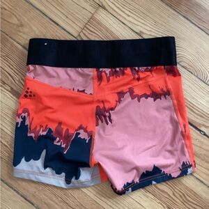 Craft  Orange/Navy running shorts size m